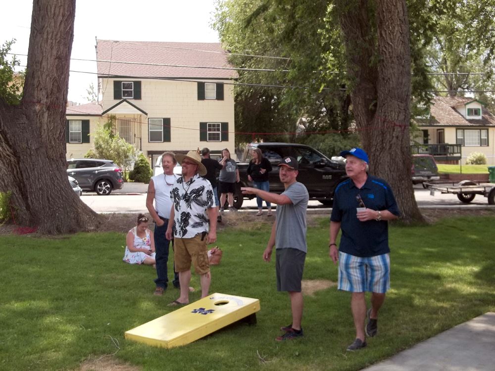 people playing games in the yard