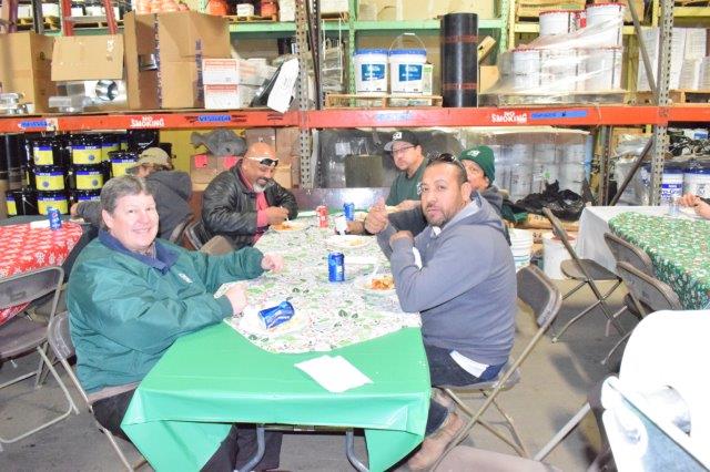 people eating in a warehouse 