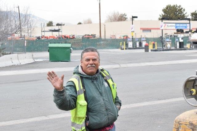 image of man waving